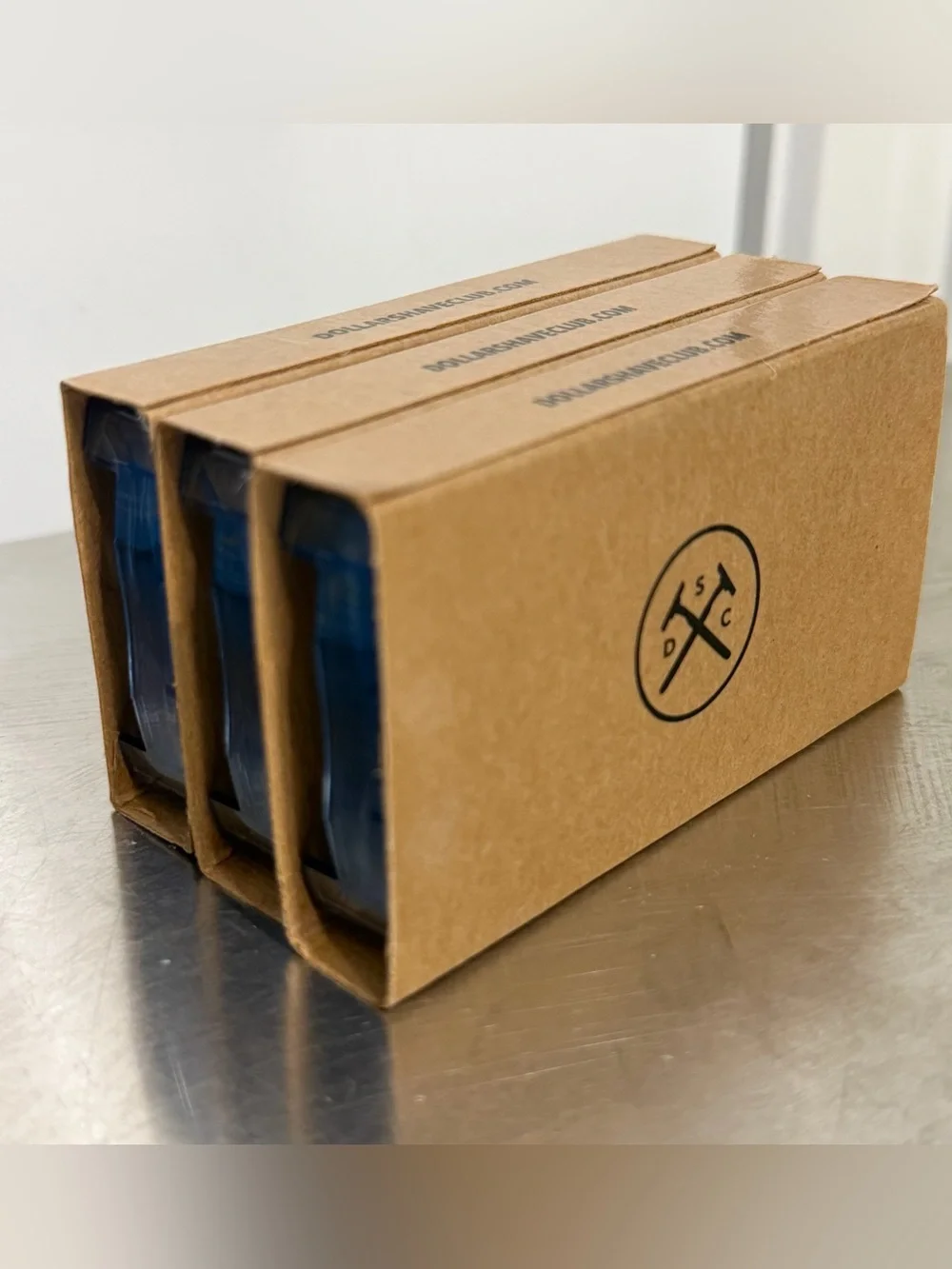 (12) DOLLAR SHAVE CLUB 